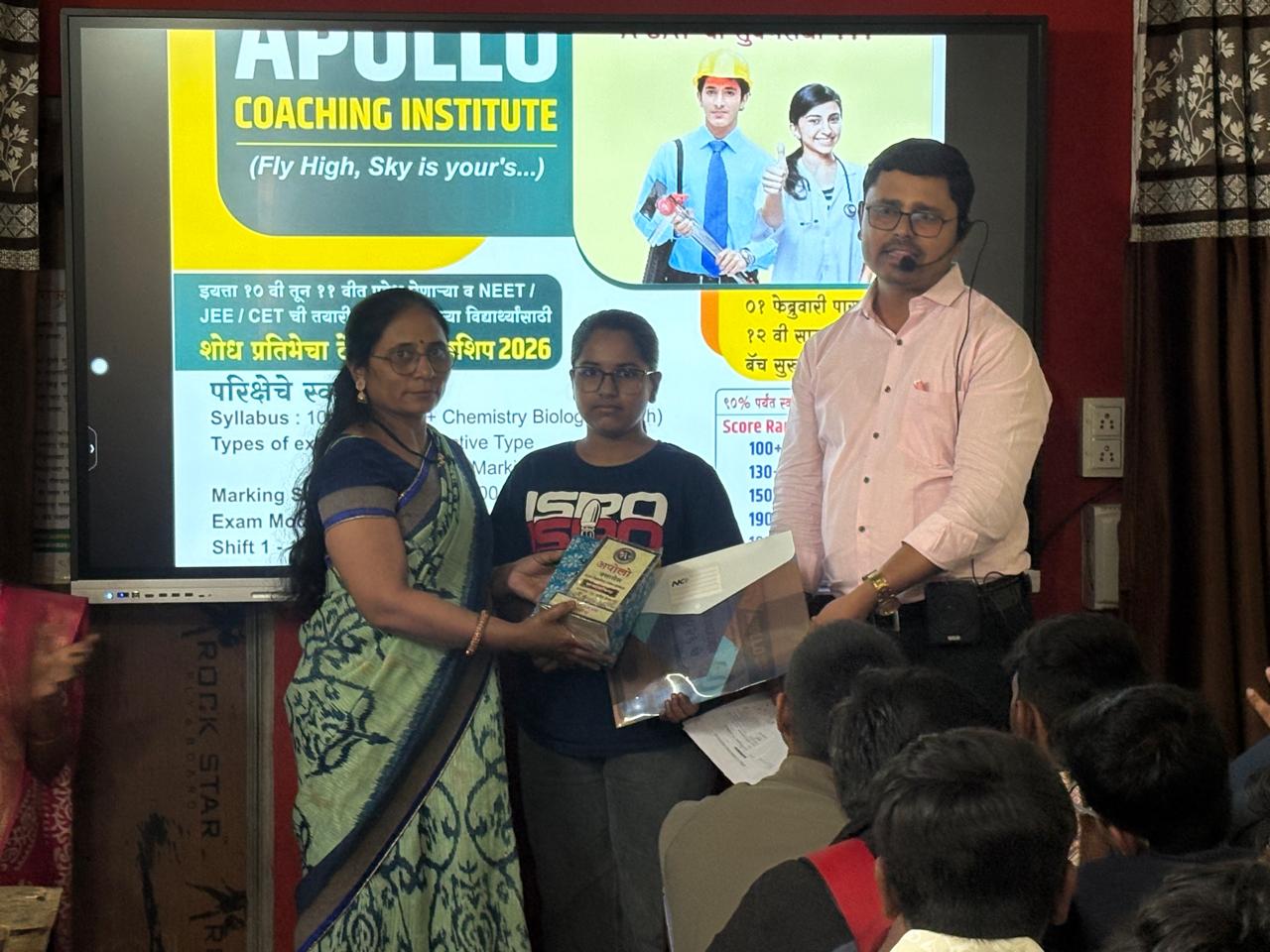 Student award presentation at Apollo Coaching Institute