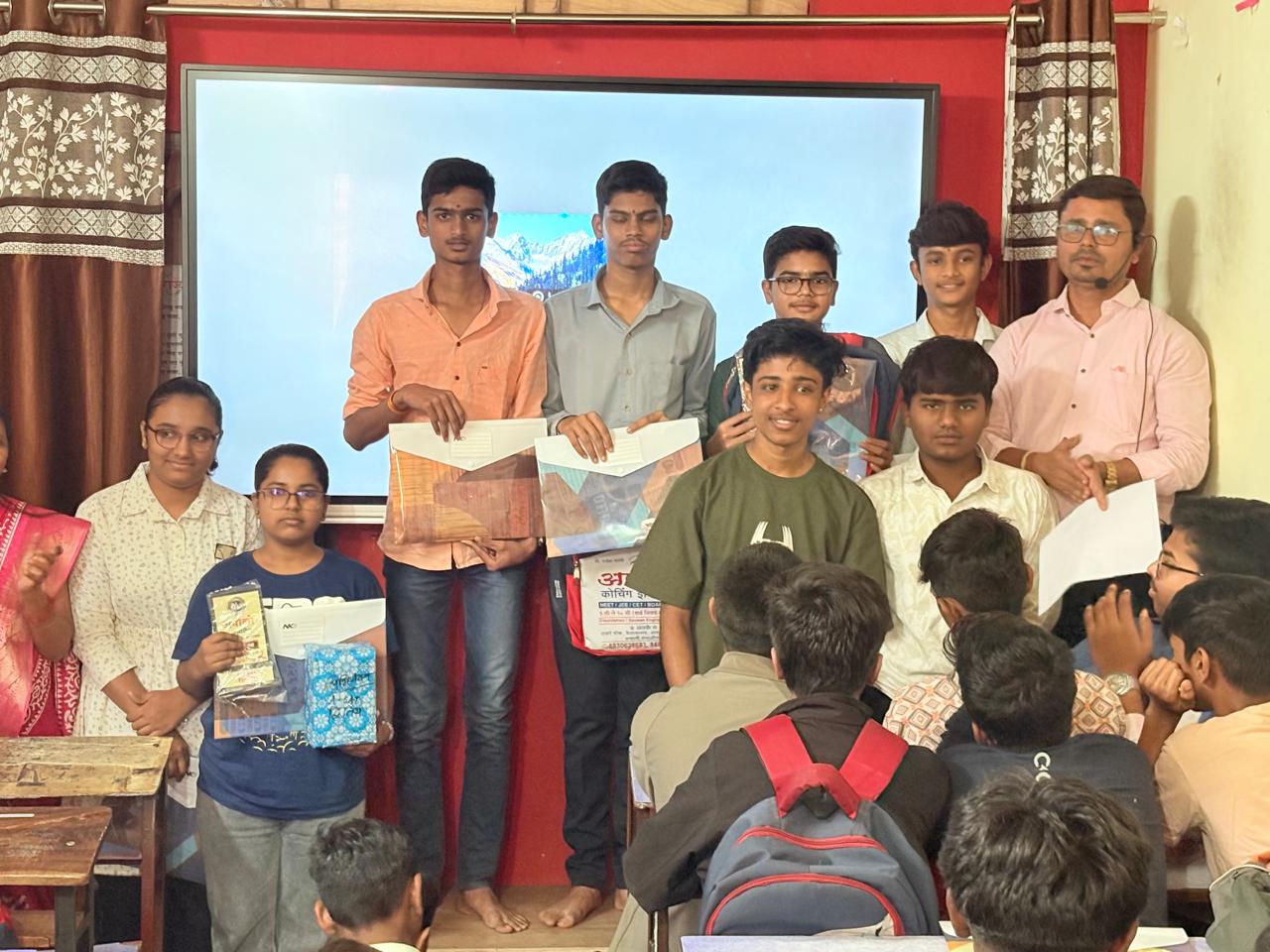 Award ceremony with student and teachers